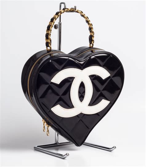 black lacquer vintage chanel bag|Vintage Chanel heart shoulder bag.